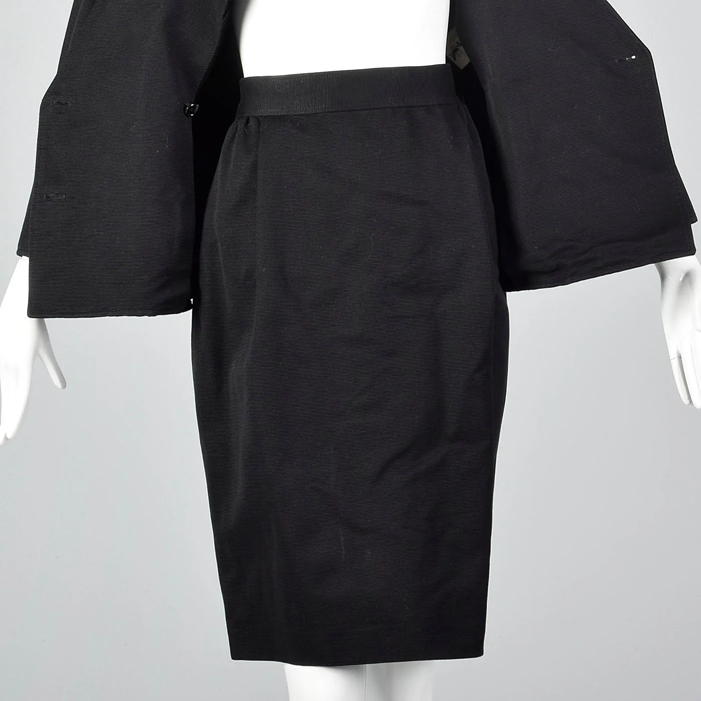 1980s Ungaro Solo Donna Black Peplum Suit