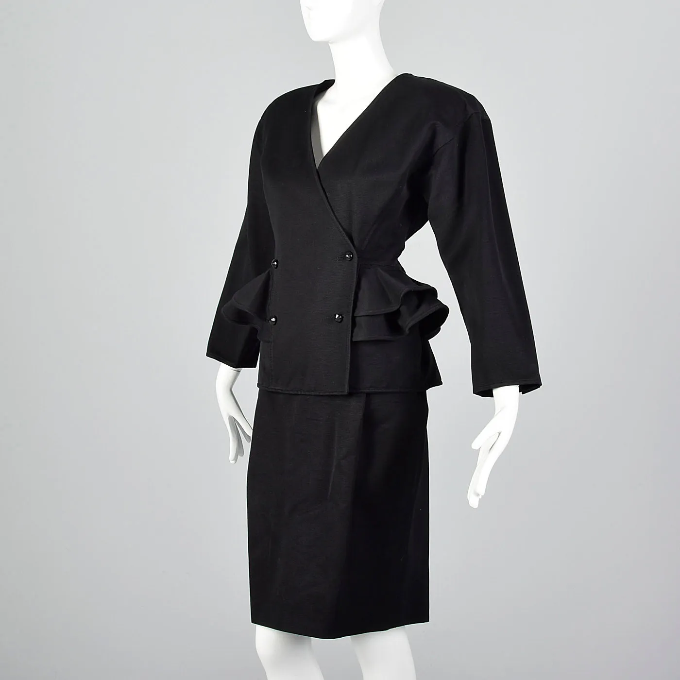 1980s Ungaro Solo Donna Black Peplum Suit