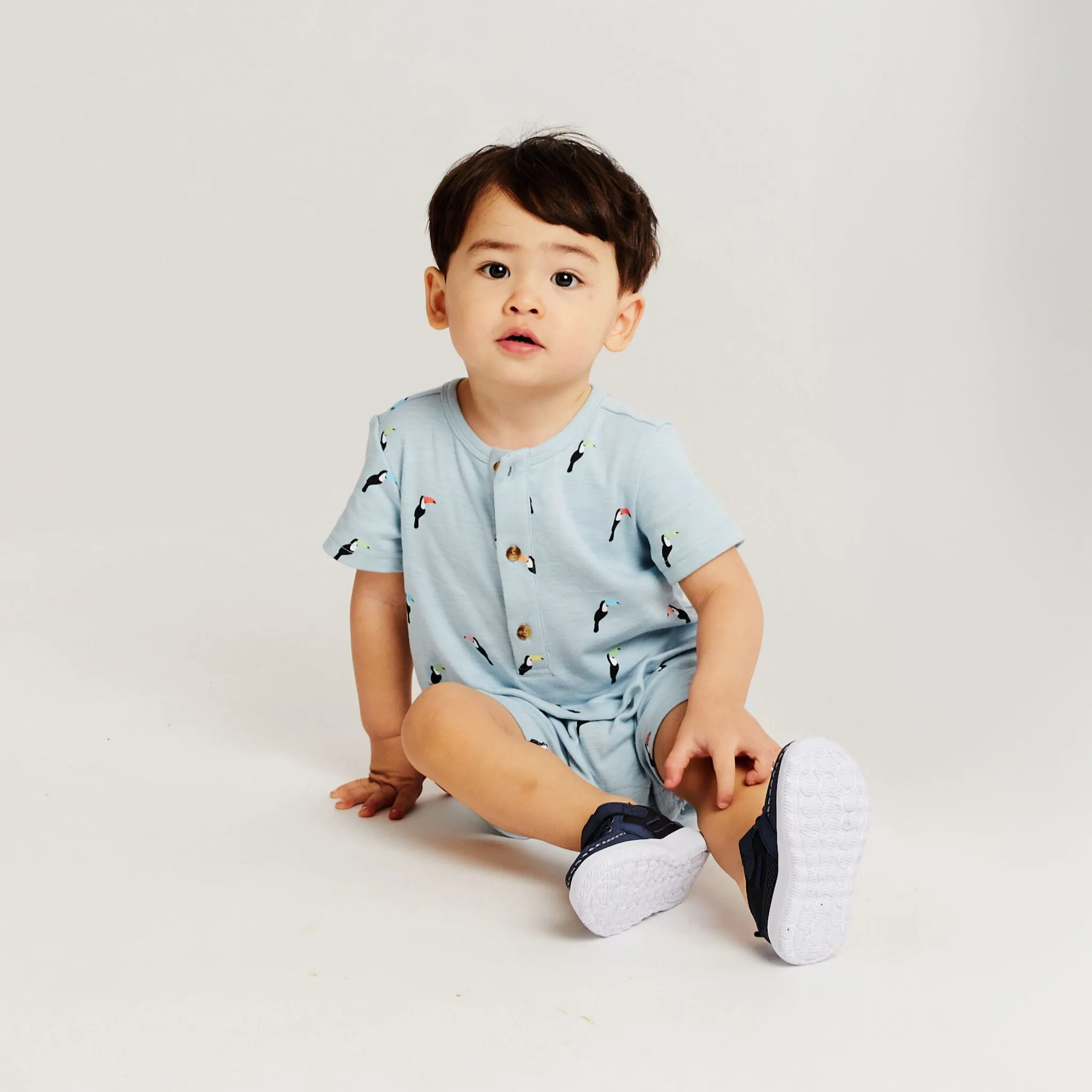 Infant Knit Short Sleeve Romper with Bib | Blue Toucan Print