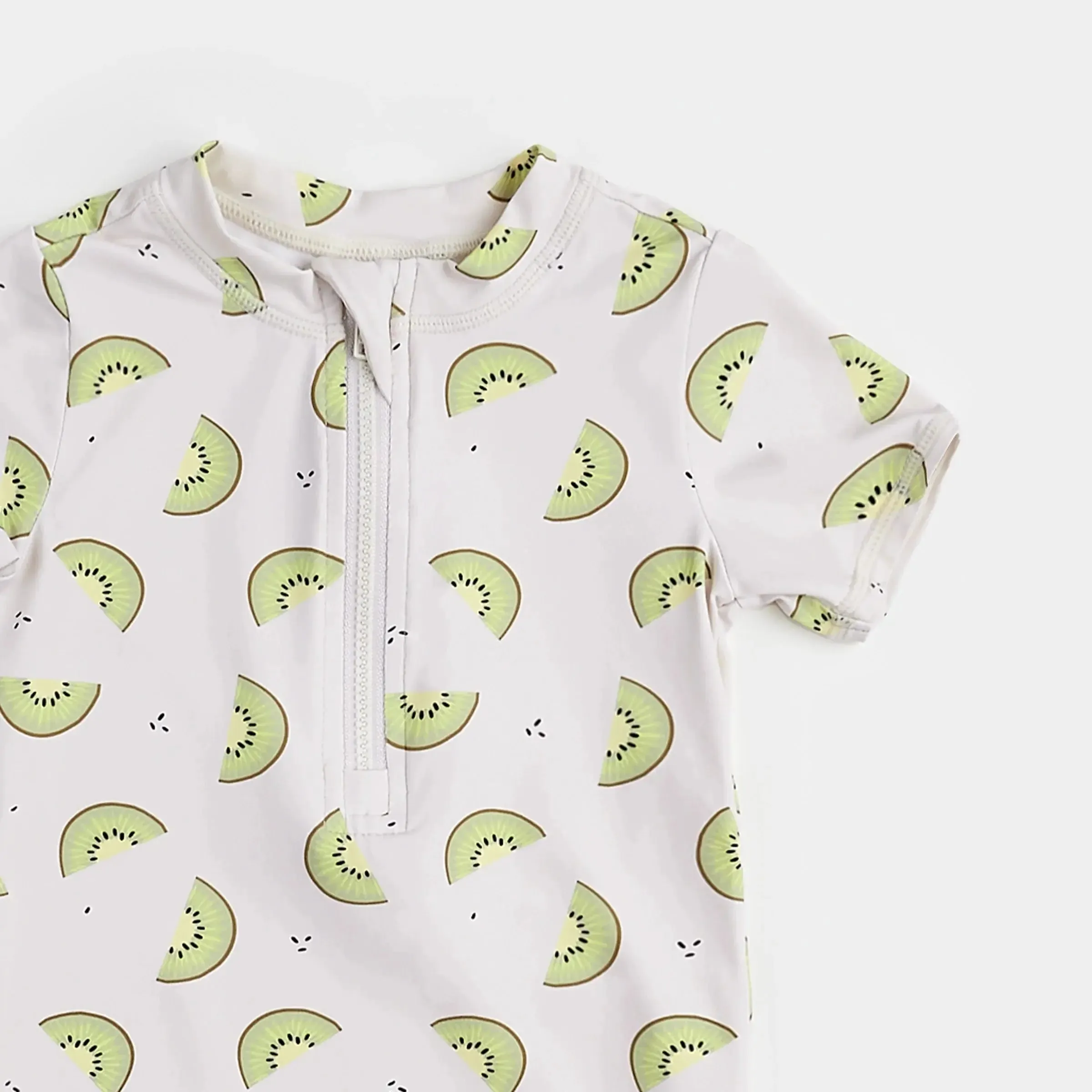 Kiwi Print On Crème Swim Romper | Petit Lem