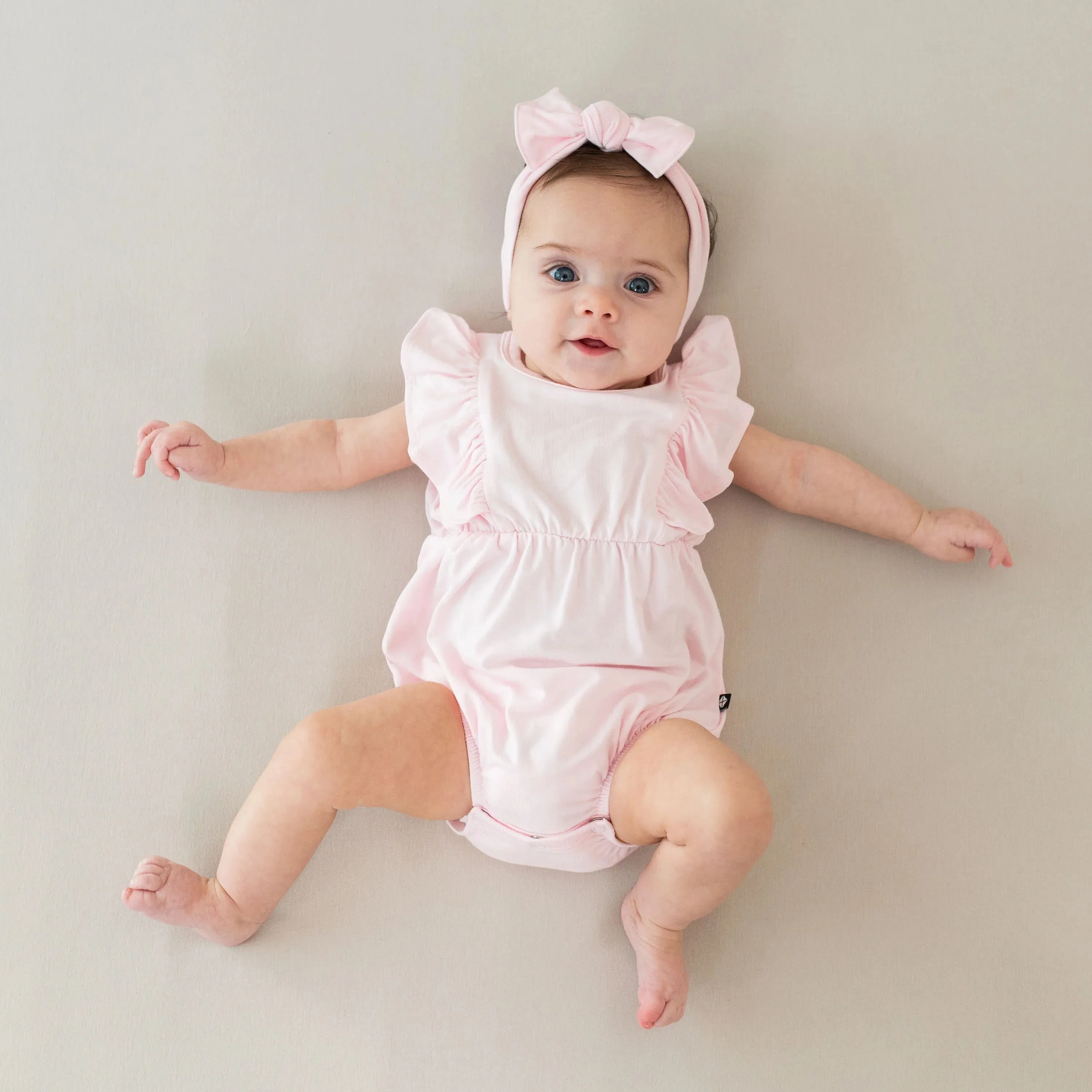 KYTE BABY Bubble Romper in Sakura